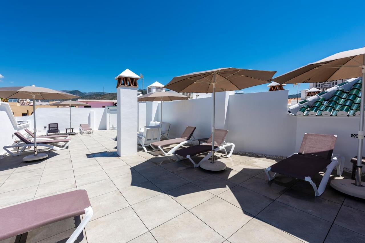 Apartamentos Toboso Plaza 内尔哈 外观 照片 Rooftop pool at the Hotel